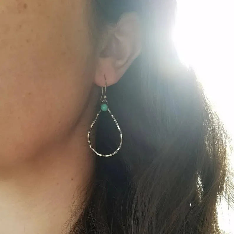 Bohemian style geometric circle earrings with turquoise accents in antique silver finish