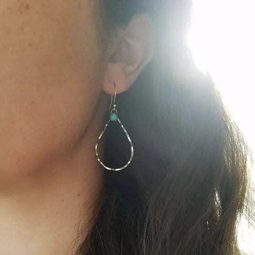 Bohemian style geometric circle earrings with turquoise accents in antique silver finish