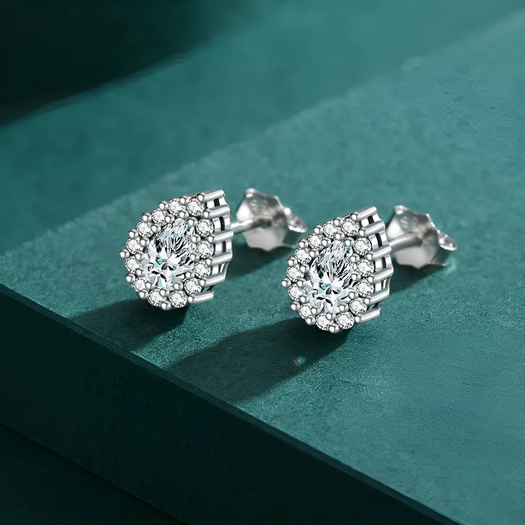 Silver water drop shaped ear studs with diamond treatment surface texture