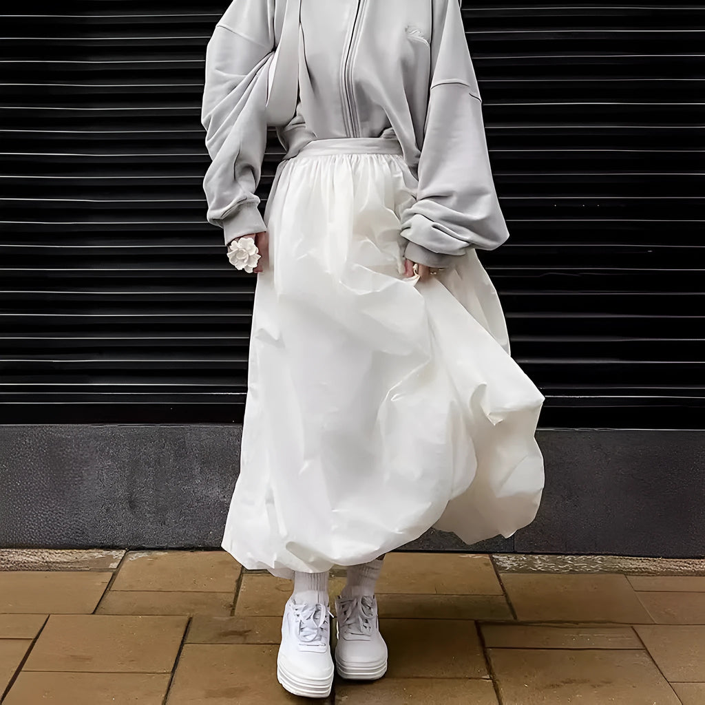 Women's solid colour cotton long skirt with elasticated waistband in black or white