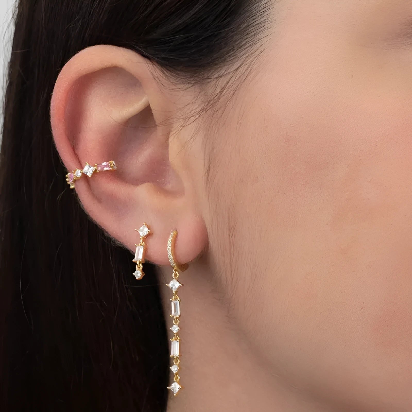 Geometric gold U-shaped earrings with a tassel and colourful zircon gemstones for women.