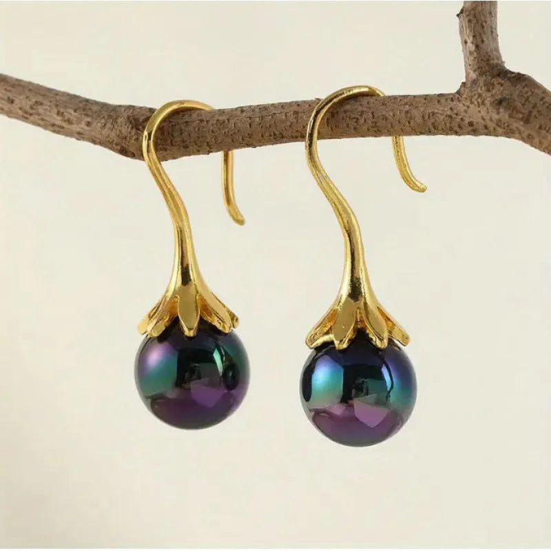 Gold electroplated alloy earrings with retro fashion design for women