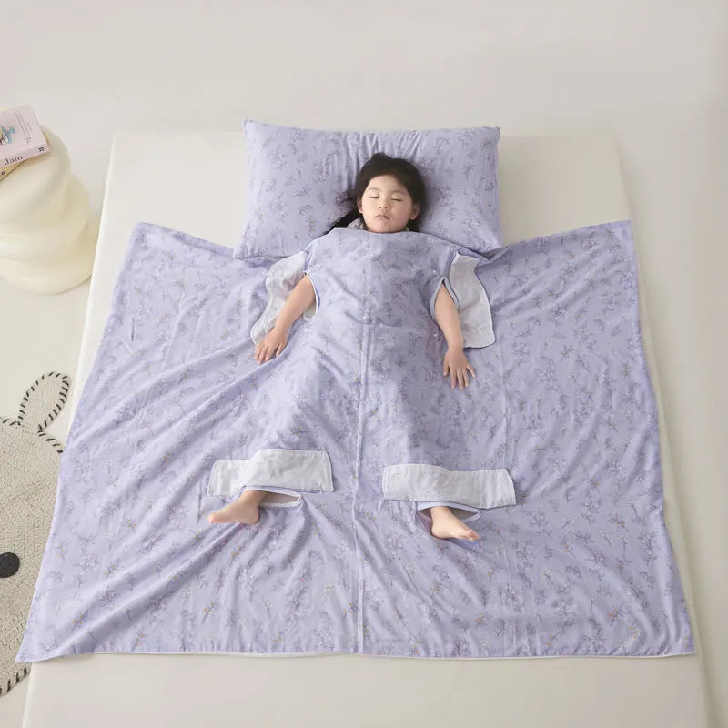 Anti-kick sleeping bag blanket in a summer design on a bed, showing its lightweight texture.
