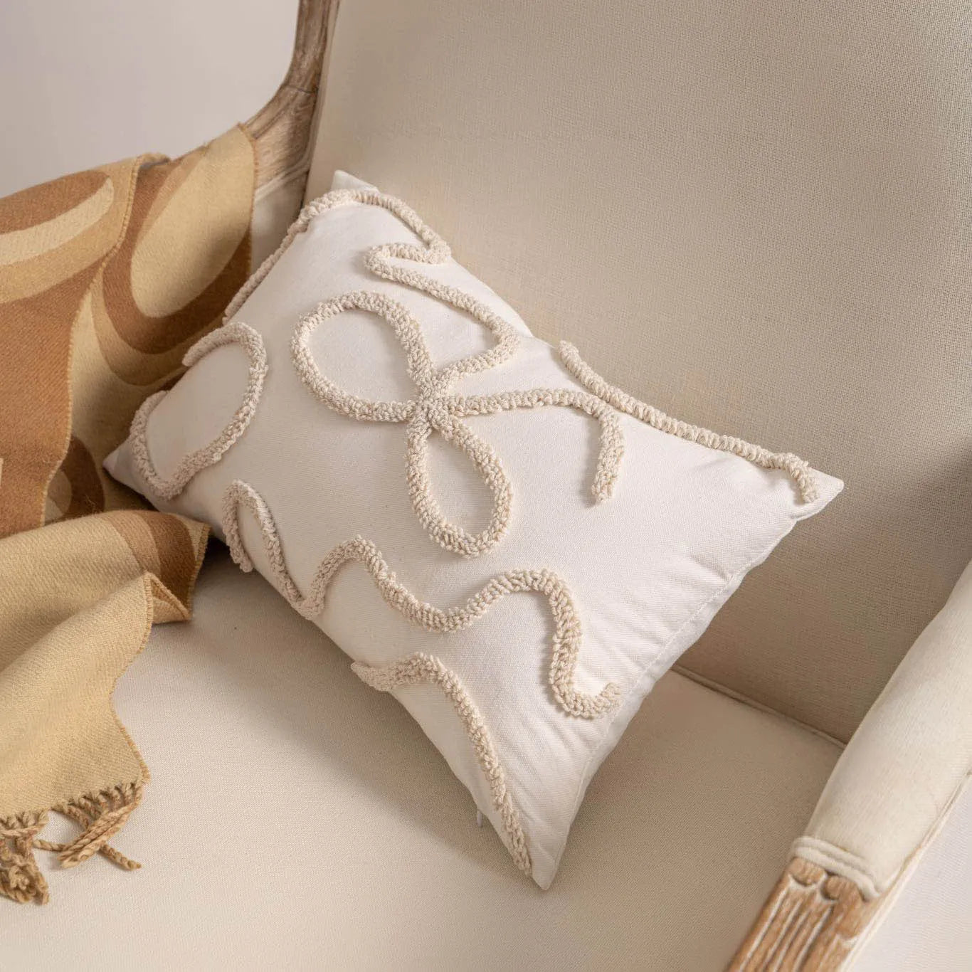 Decorative knitted sofa cushion cover with tassel trim in a choice of six patterns and two sizes.