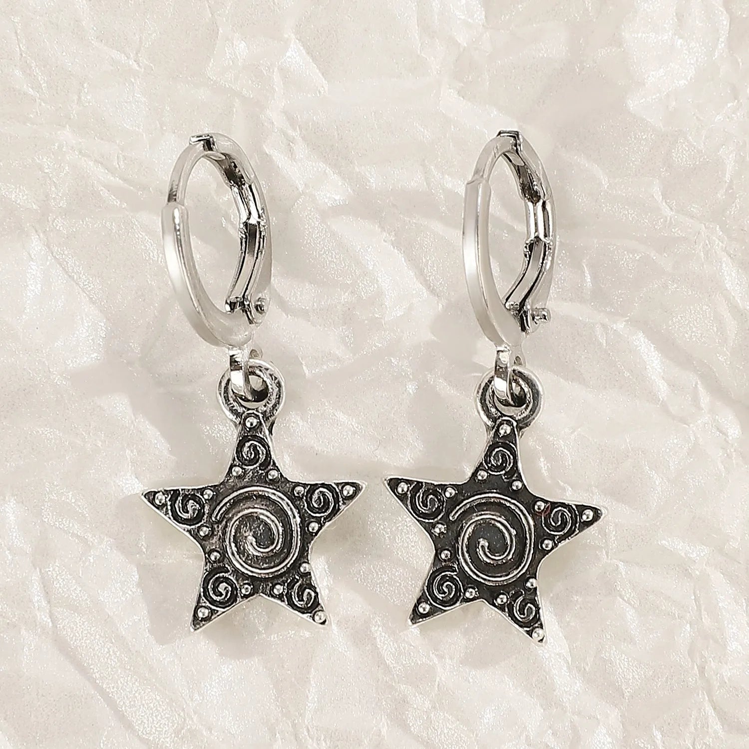 Women's alloy cross crystal earrings in five designs: white cross, peach heart, black cat, antique silver star.