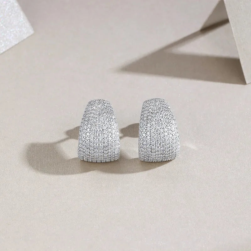 Geometric S925 sterling silver stud earrings with D-E colour moissanite stones.