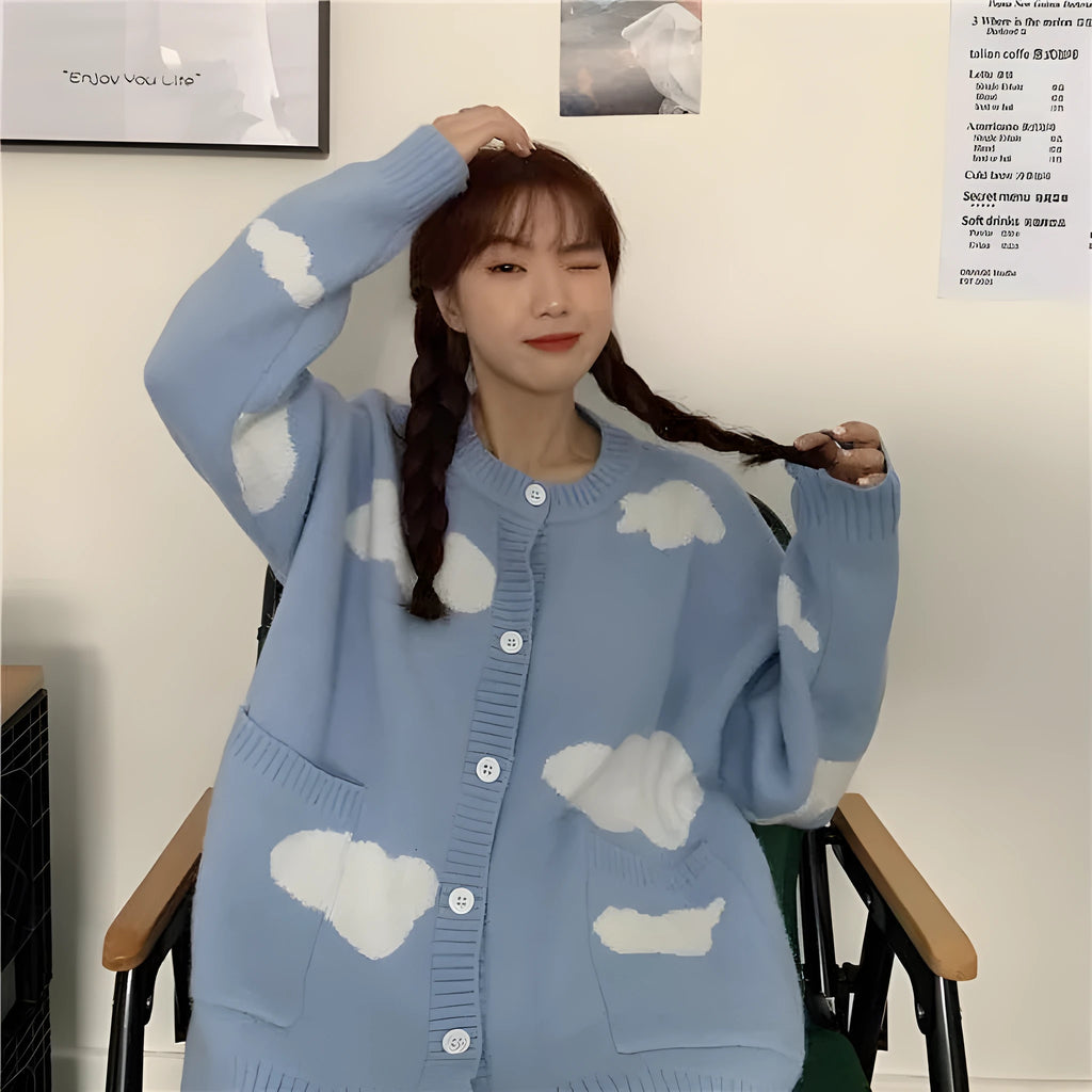 Blue cloud pattern women's loose cardigan sweater with long sleeves on hanger
