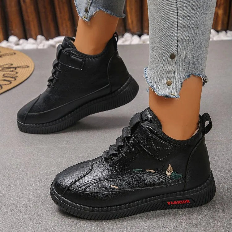 Women's black velvet slippers with rubber sole and low-cut design