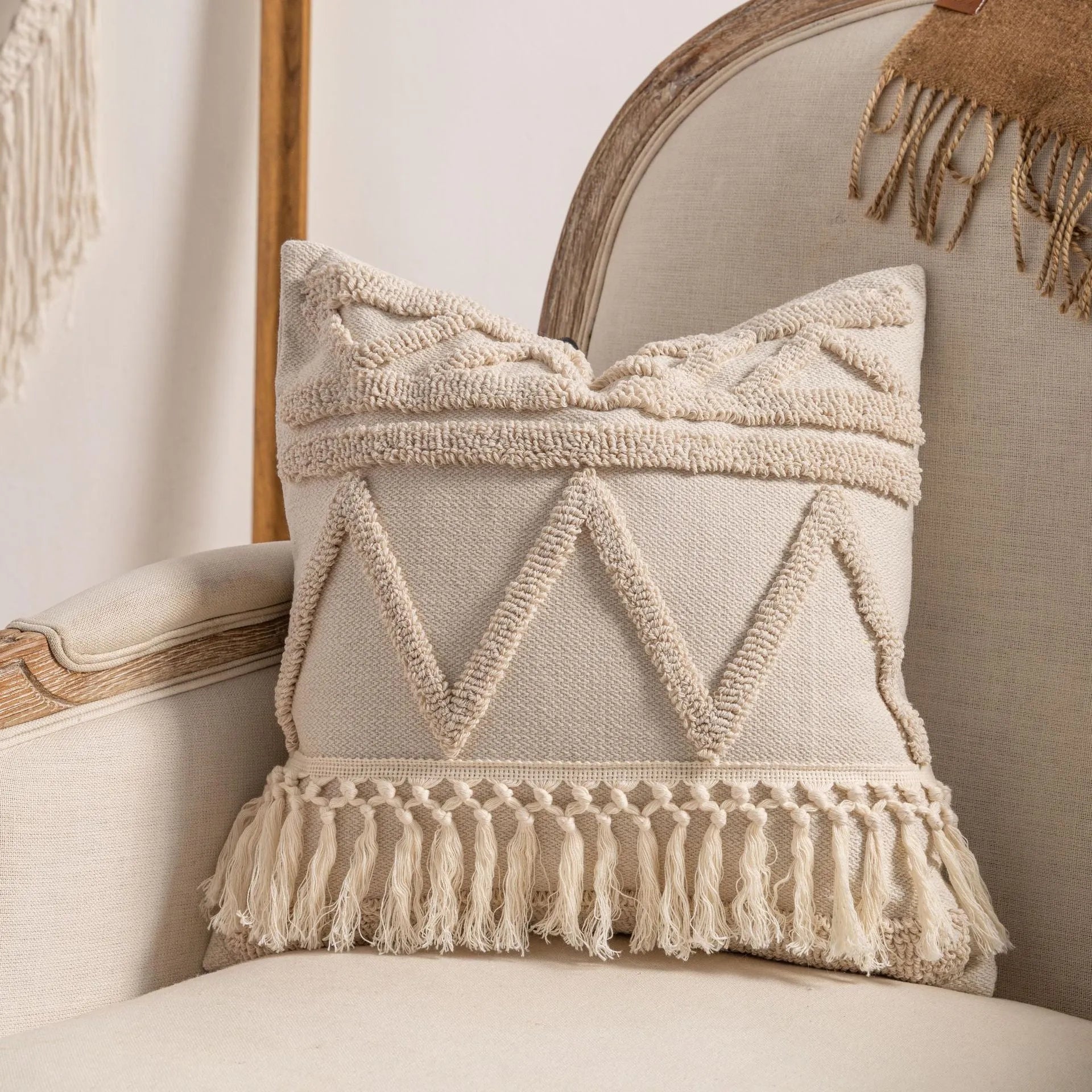 Decorative knitted sofa cushion cover with tassel trim in a choice of six patterns and two sizes.