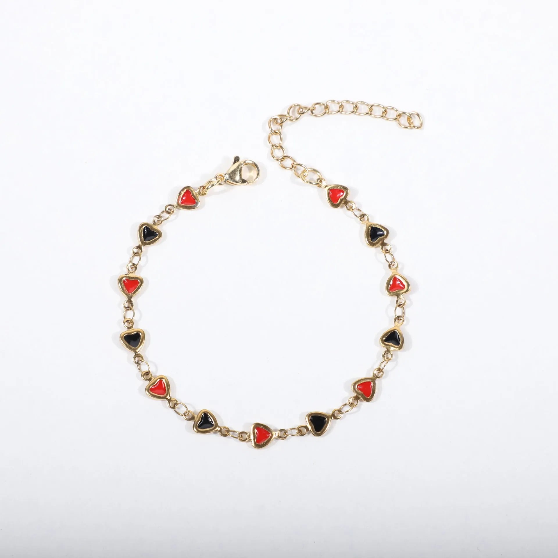 Stainless steel bracelet with heart design and gold plating in multiple colour options