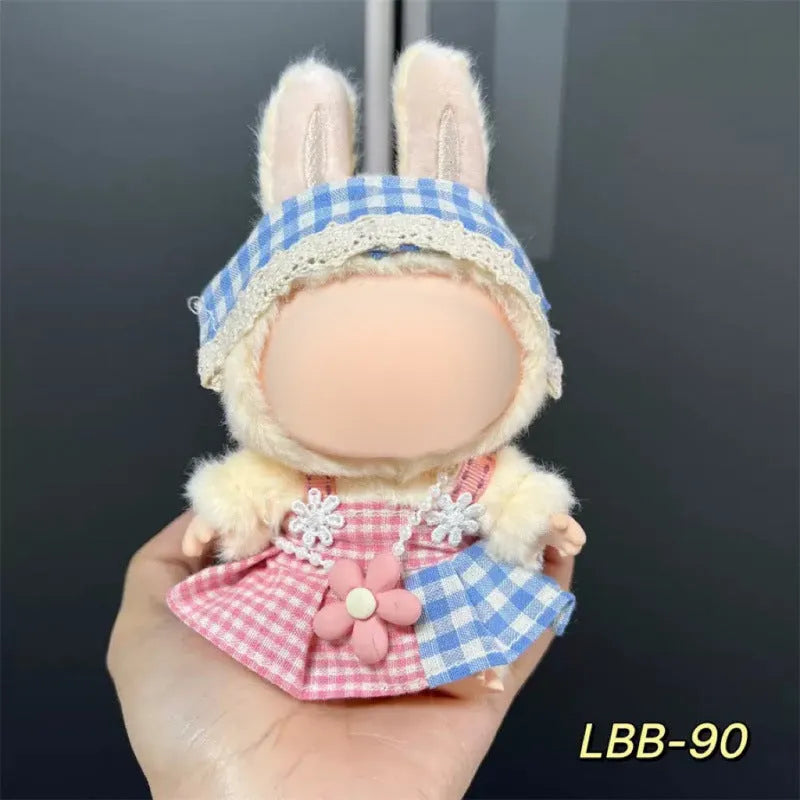 A plastic doll costume outfit for a 17cm tall vinyl figurine on a white background.