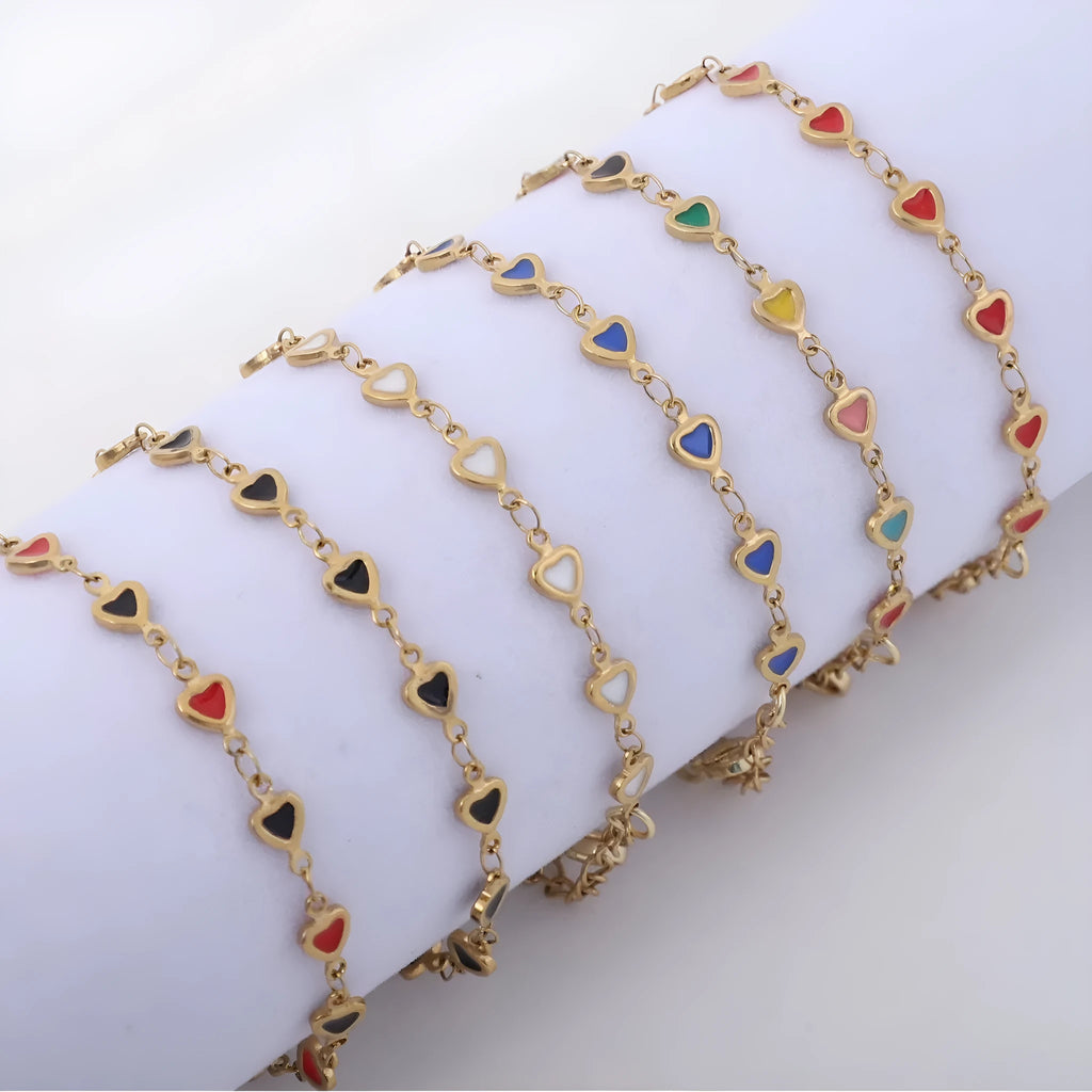 Stainless steel bracelet with heart design and gold plating in multiple colour options