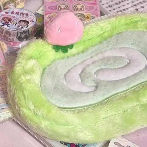 Velvet Swiss roll cake design pencil case in Korean style for stationery storage.