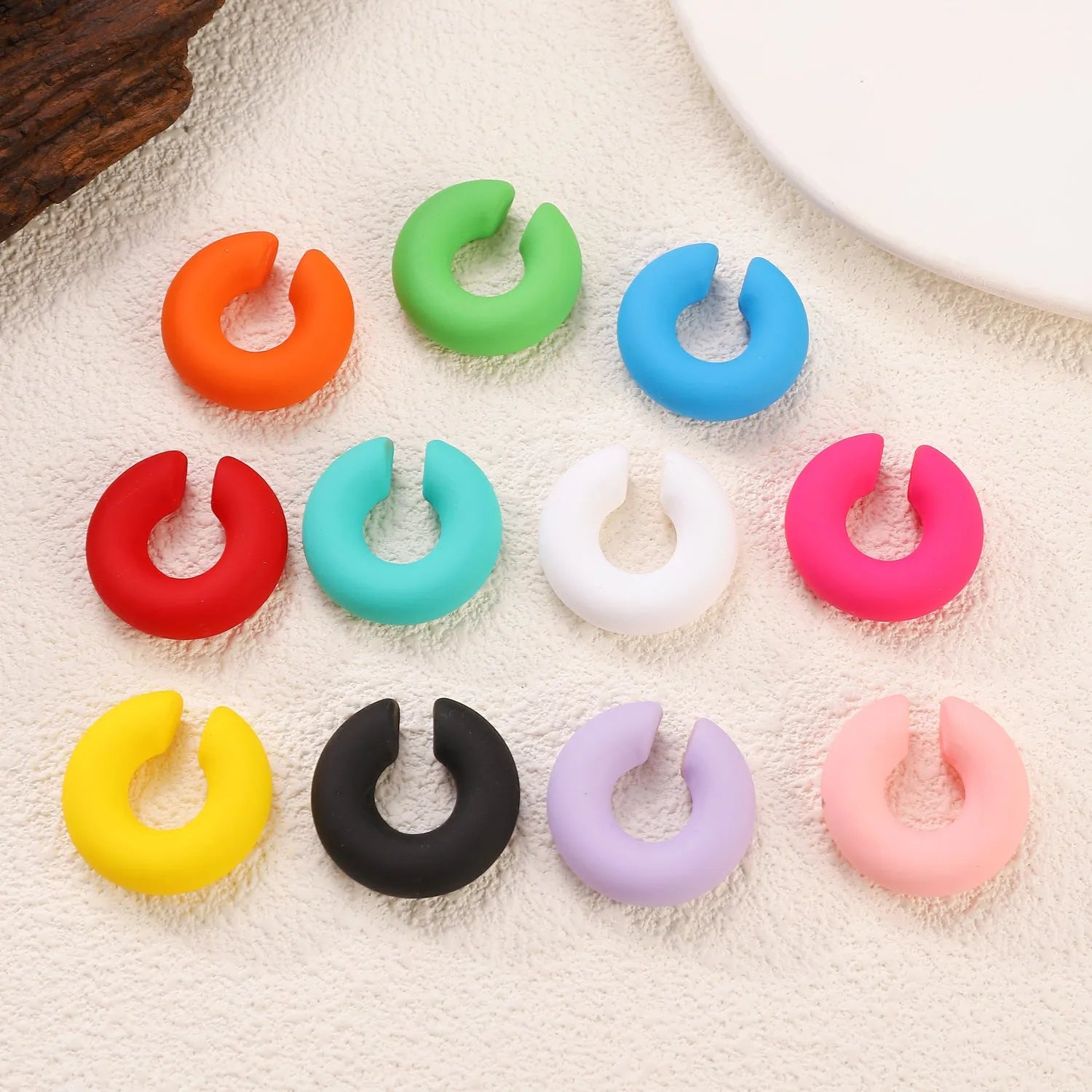 Round C-shaped matte finish clip-on earrings for women in various candy colours
