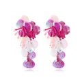 Close-up of colourful handmade bead flower earrings with leaves in European exaggerated style.