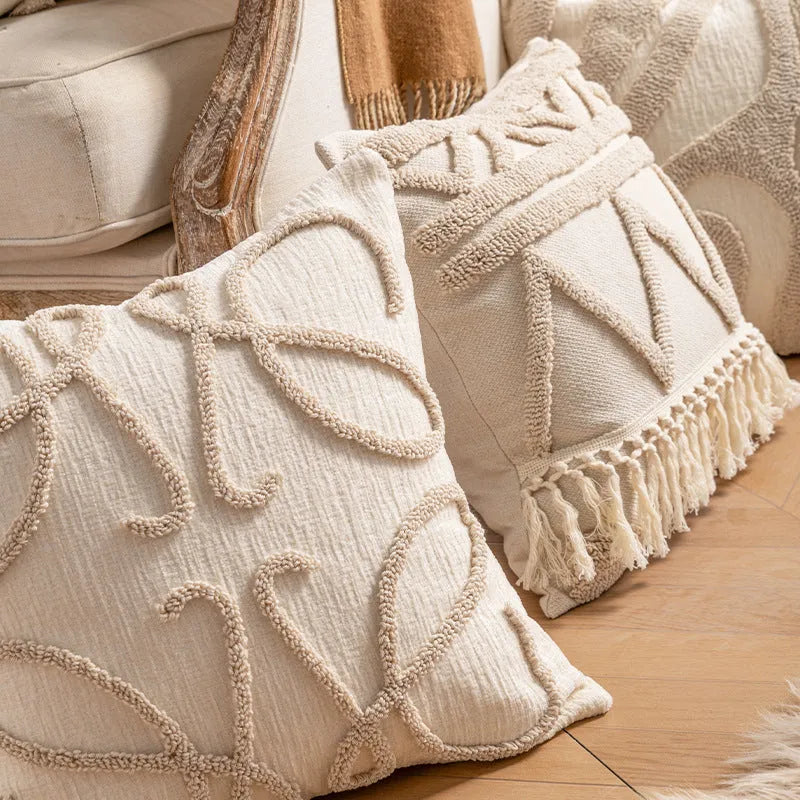 Decorative knitted sofa cushion cover with tassel trim in a choice of six patterns and two sizes.
