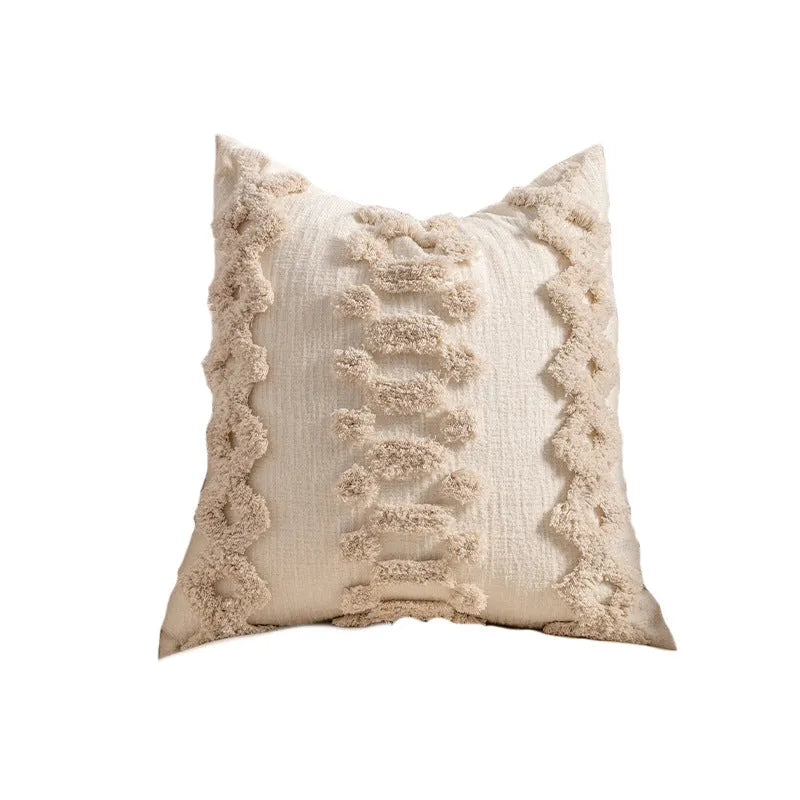 Decorative knitted sofa cushion cover with tassel trim in a choice of six patterns and two sizes.