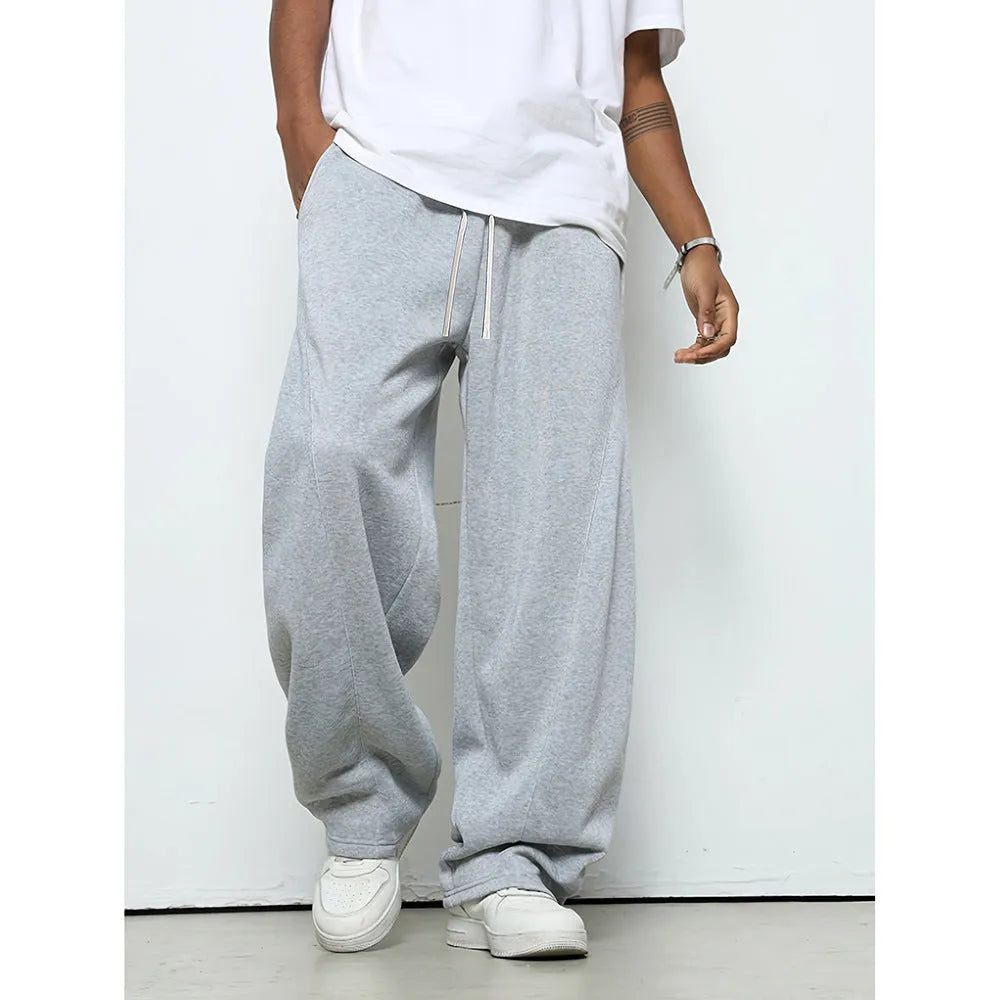 Men's straight leg casual trousers in black colour with elastic waistband and drawstring closure
