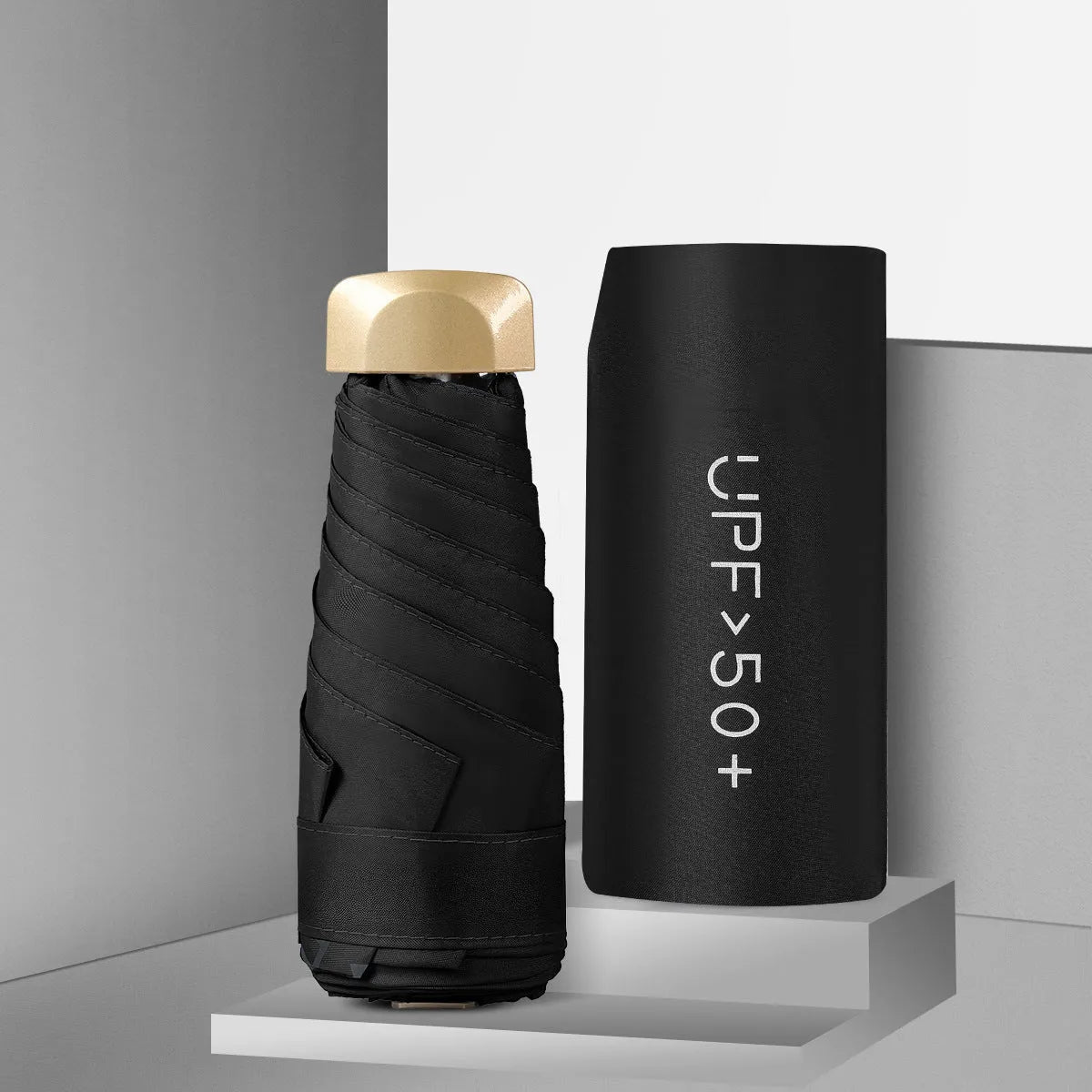 Closed 5-fold mini pocket sun umbrella showing compact size and rubber handle