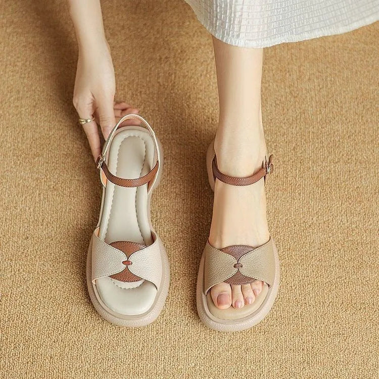 Women's beige platform sandals with chunky heel and open toe design on rubber sole