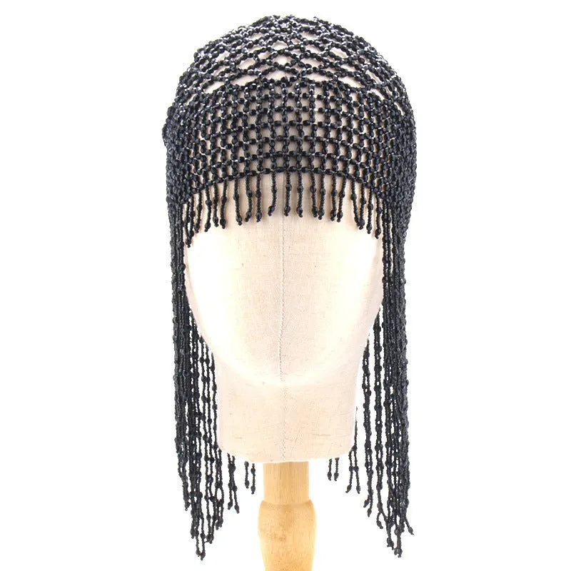 Belly dance hat with alloy frame, beaded ornamentation and tassels in silver or black