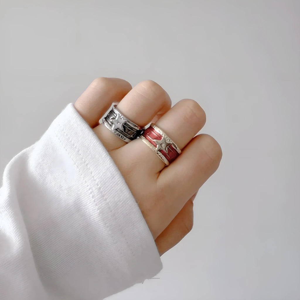 Geometric drop ring with distressed finish and adjustable band