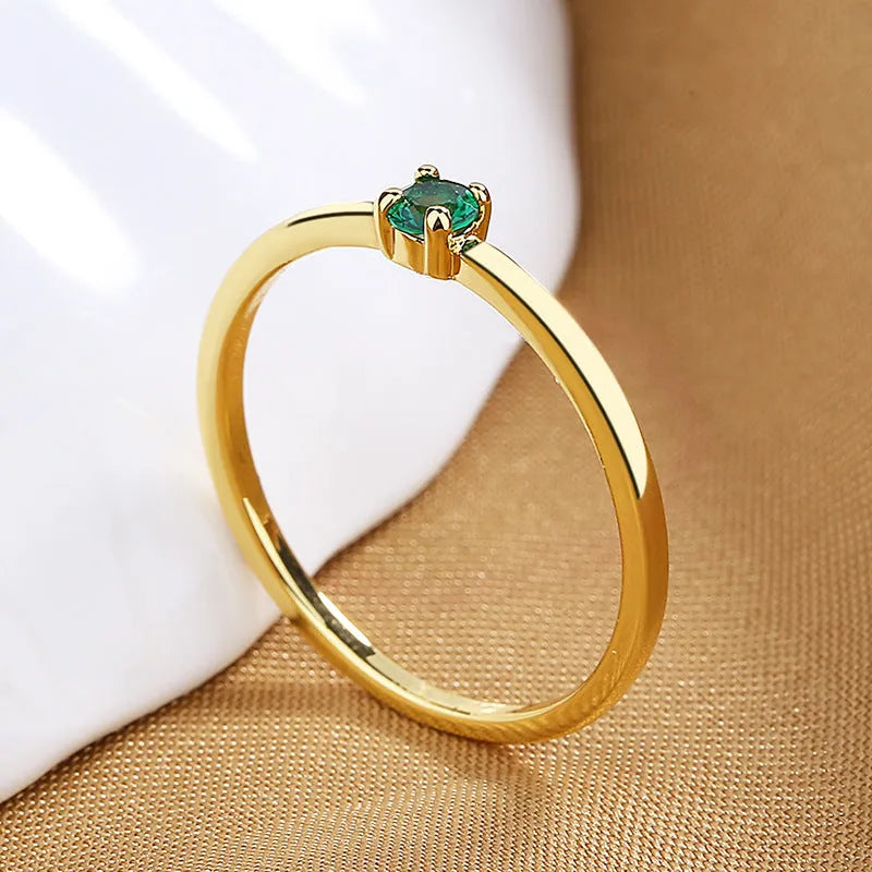 Women's copper ring with single diamond geometric design in round circle shape showing colour options