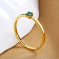 Women's copper ring with single diamond geometric design in round circle shape showing colour options