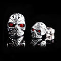 Red eye ghost head skull stud earrings in electroplated alloy with artificial gemstone inlay