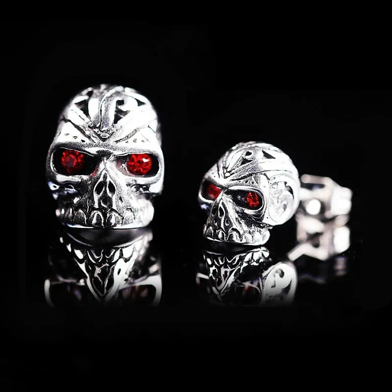 Red eye ghost head skull stud earrings in electroplated alloy with artificial gemstone inlay