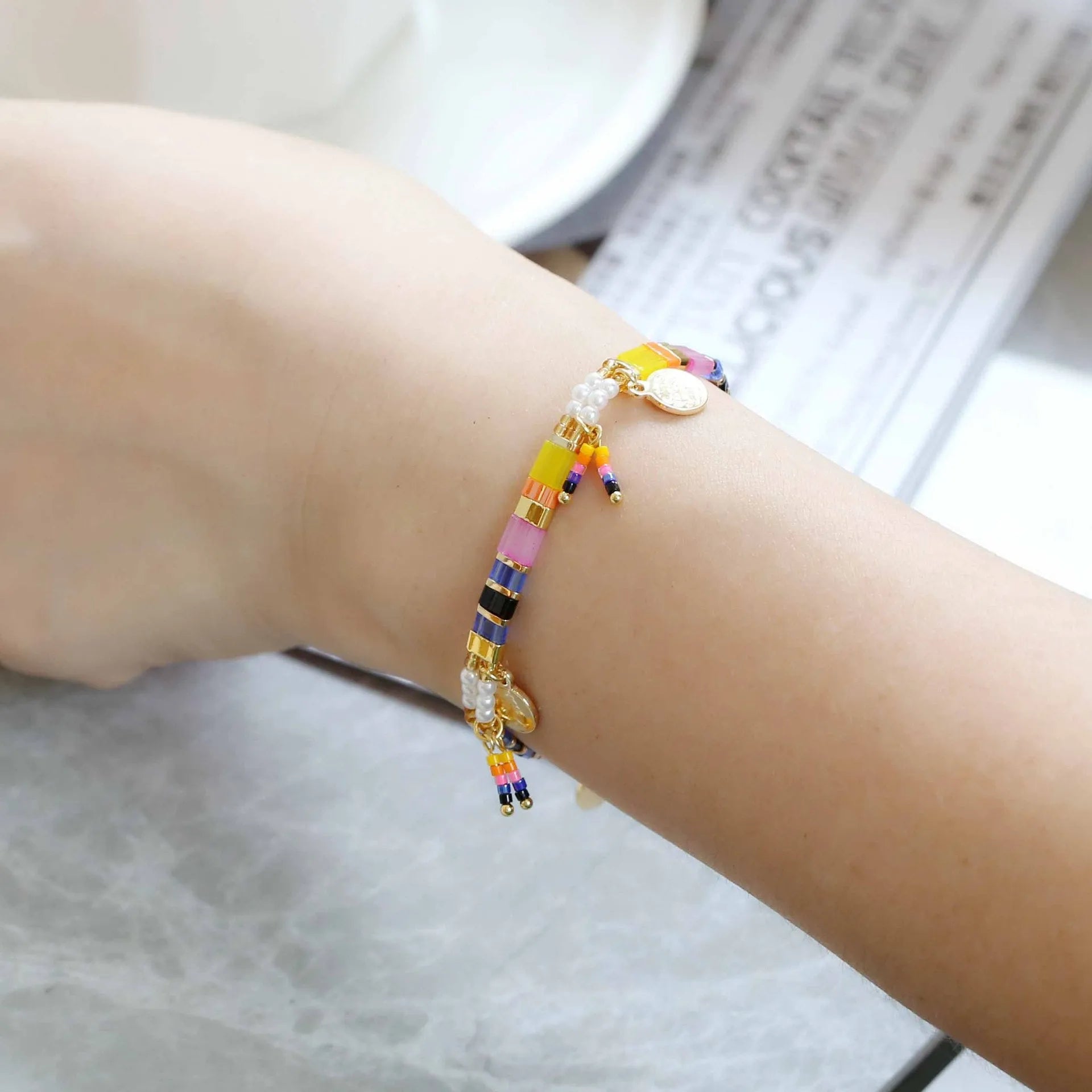 Women's handmade glass coloured beaded bracelet with imitation pearls in European American style.