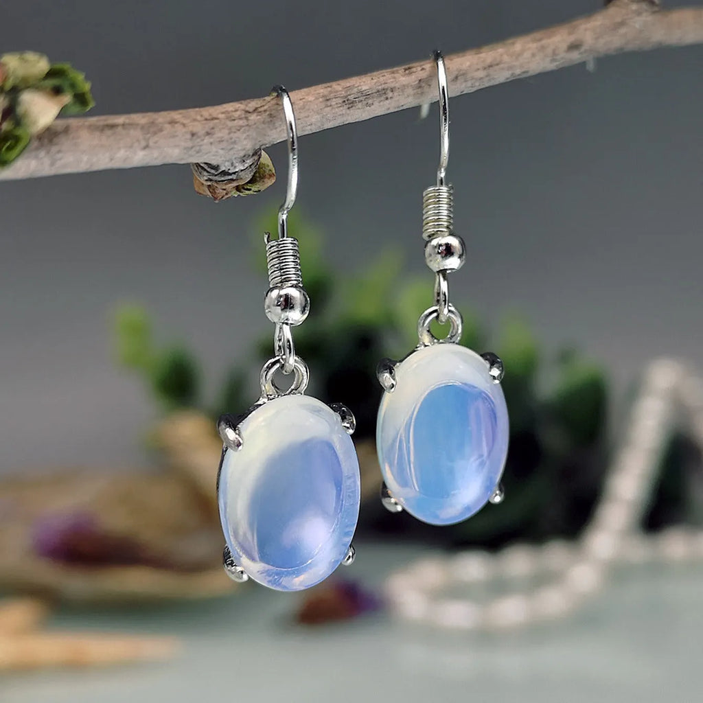 Opal cross pendant drop earrings with moonstone crystal accents measuring 20-24cm in retro vintage style