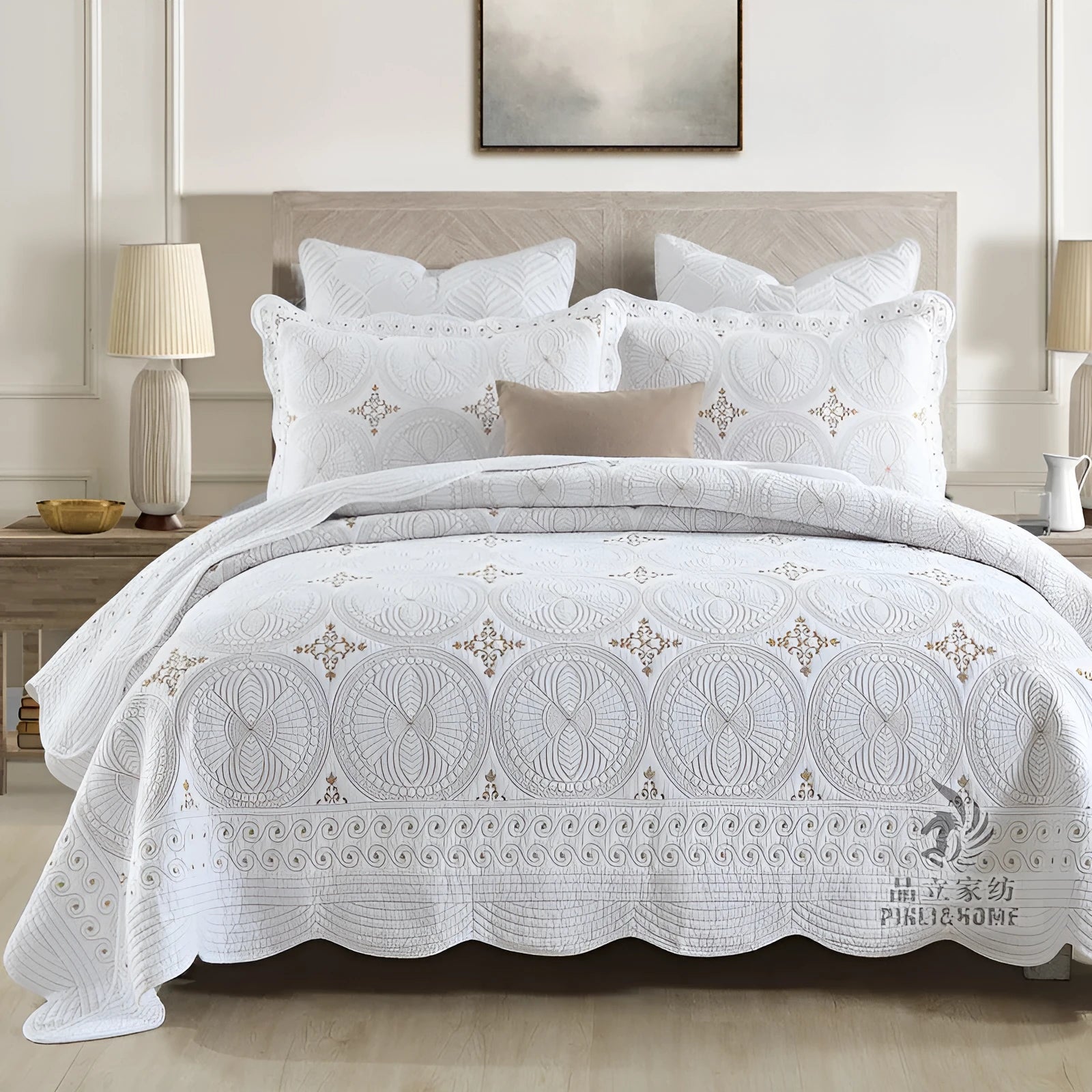 Double thick pure cotton European-style embroidered bed cover set with two pillowcases on a bed.