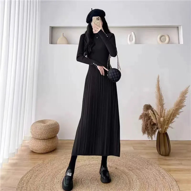 Women's high waist A-line midi skirt in a wool blend knit fabric, shown in milky white colour.