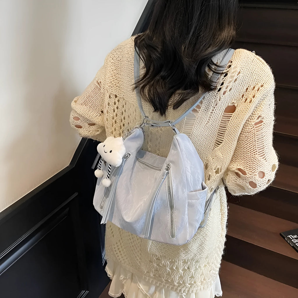 Women's soft PU fashion backpack in black, milky white, silver or blue colours