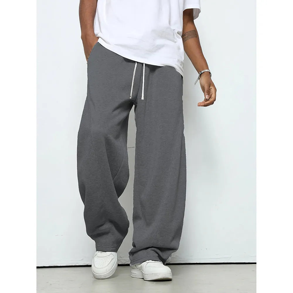 Men's straight leg casual trousers in black colour with elastic waistband and drawstring closure