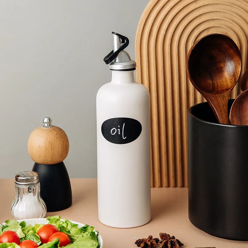 Ceramic oil pot with funnel and brush for kitchen oil storage in 650ml capacity