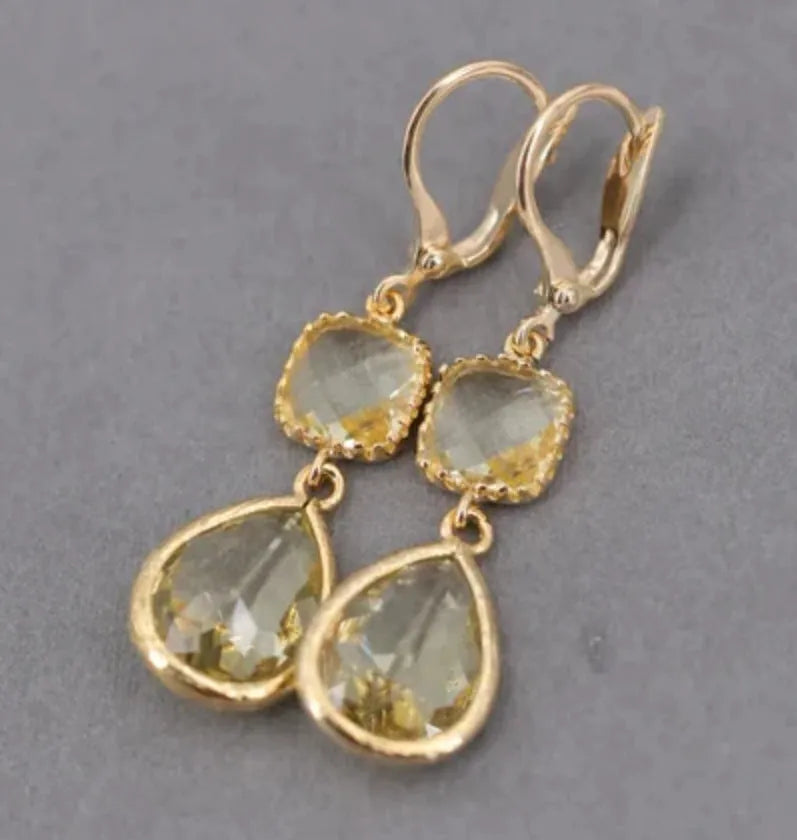 Gold geometric fringe earrings with water droplet design and retro styling