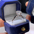 White gold plated zircon ring with six-claw geometric setting on white copper base