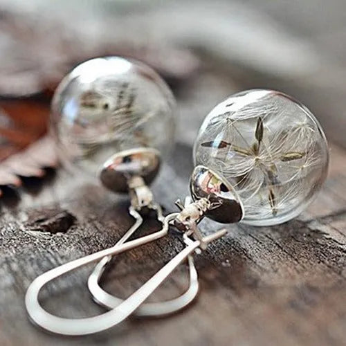 Transparent 16mm glass ball earrings with dandelion seed crystal design on silver French hooks