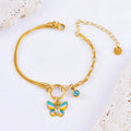Gold titanium steel butterfly jewellery set with necklace and bracelet on snake bone chains
