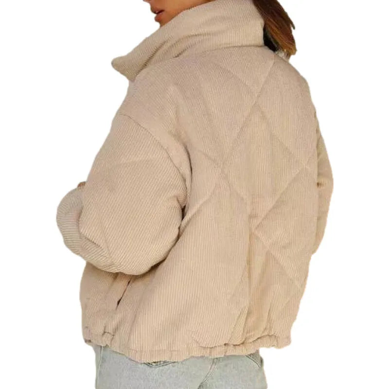 Women's apricot corduroy jacket with wadded quilting, stand collar, and zip-front closure