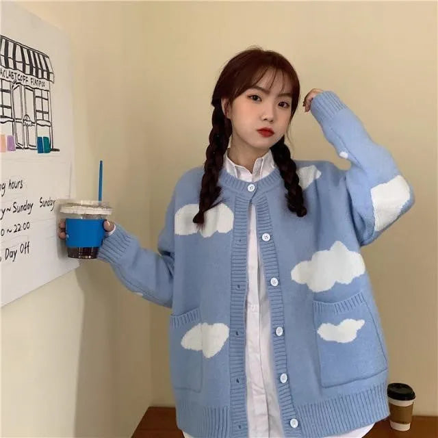 Blue cloud pattern women's loose cardigan sweater with long sleeves on hanger