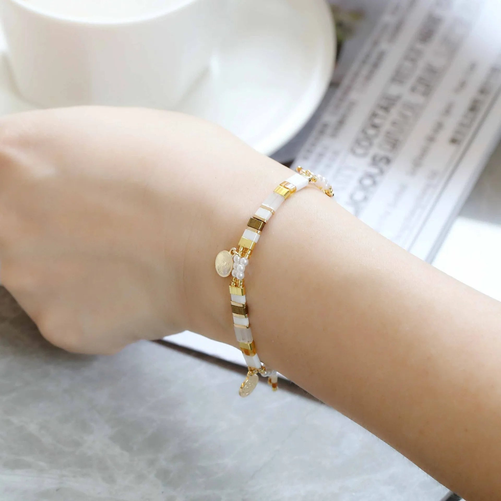 Women's handmade glass coloured beaded bracelet with imitation pearls in European American style.