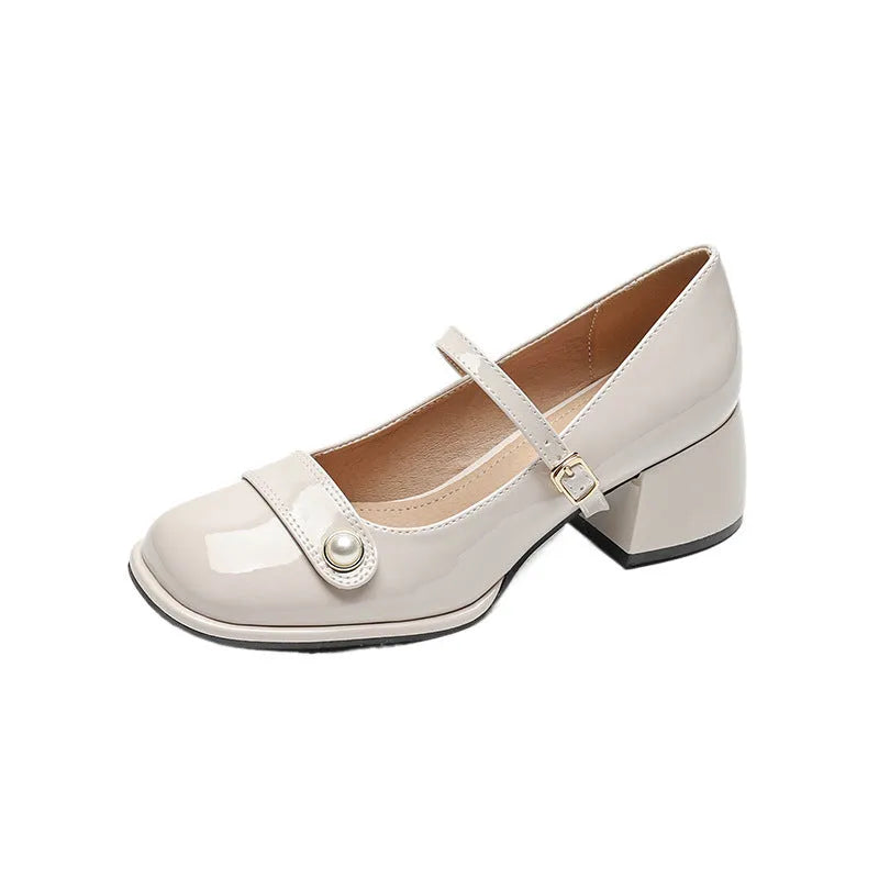 French style chunky heel hiking pump in patent leather with square toe and buckle closure