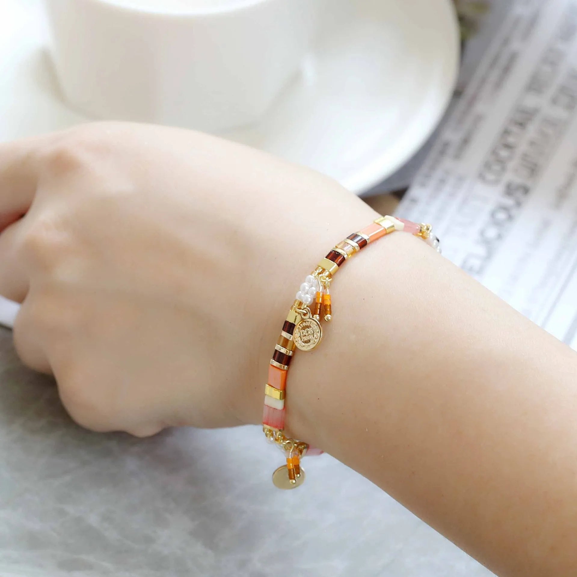 Women's handmade glass coloured beaded bracelet with imitation pearls in European American style.