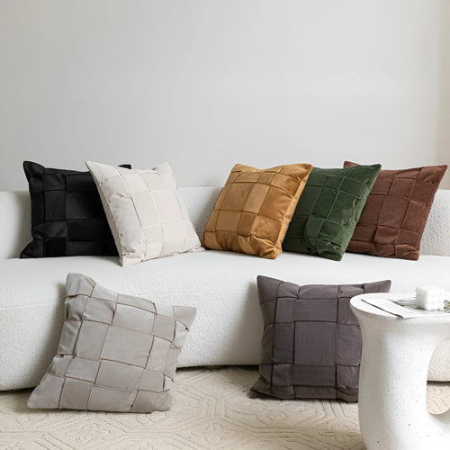 Chenille woven square cushion in beige colour on a sofa, showing its 50x50cm size and textured fabric.