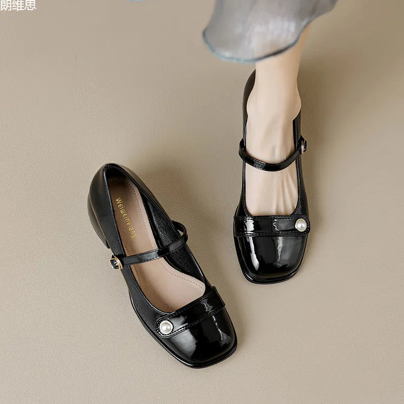 French style chunky heel hiking pump in patent leather with square toe and buckle closure