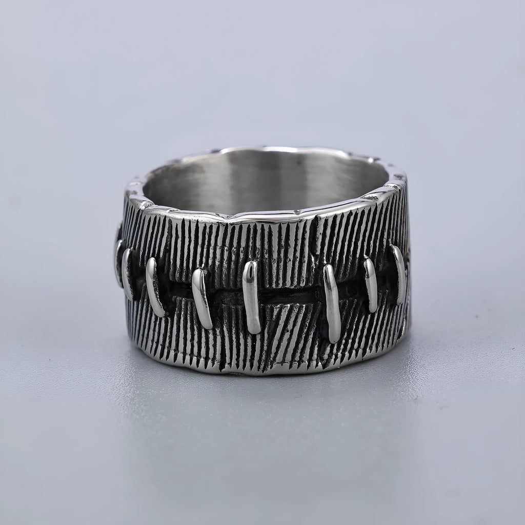 Dark punk geometric ring with double ring design and stitched detailing in retro colour on titanium steel