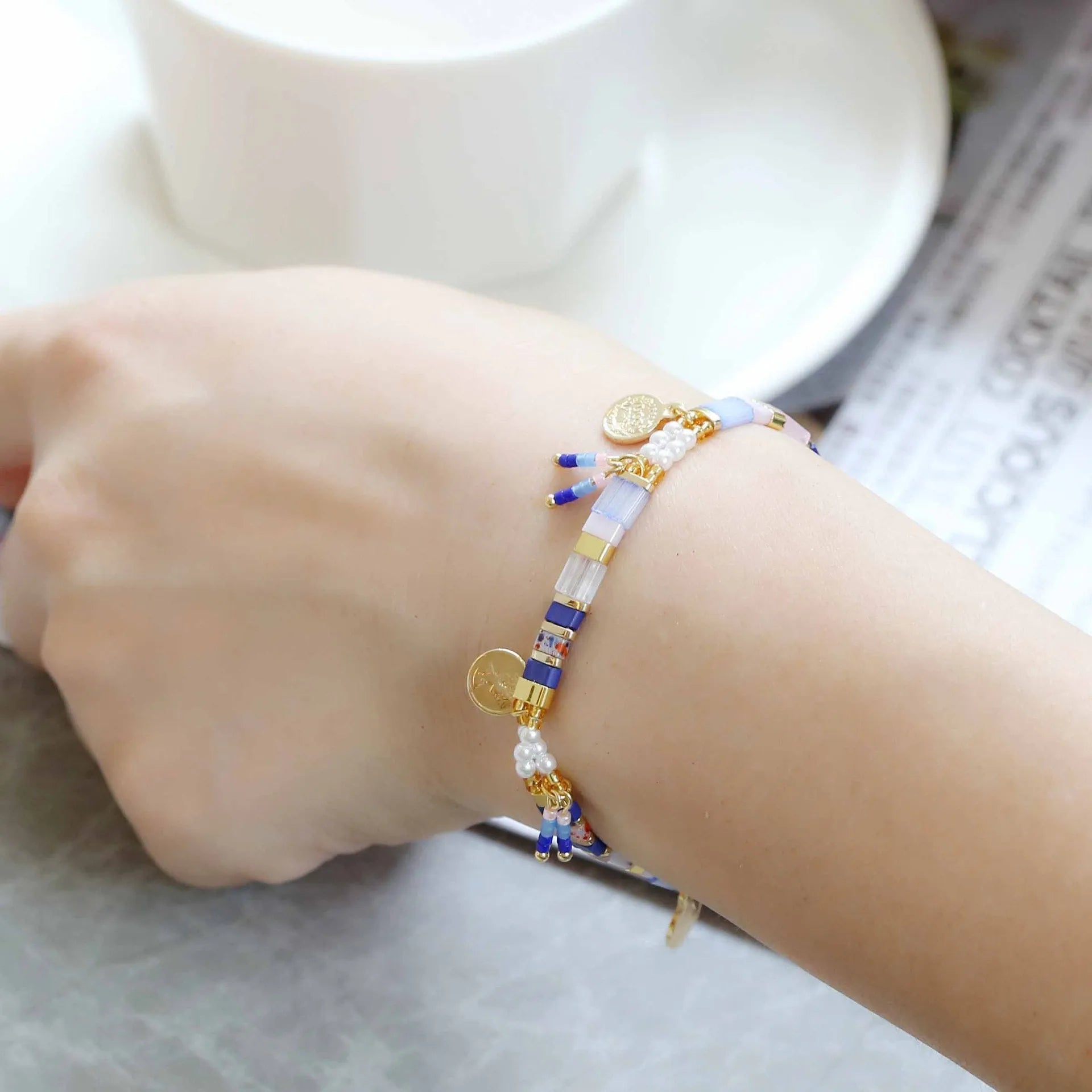 Women's handmade glass coloured beaded bracelet with imitation pearls in European American style.
